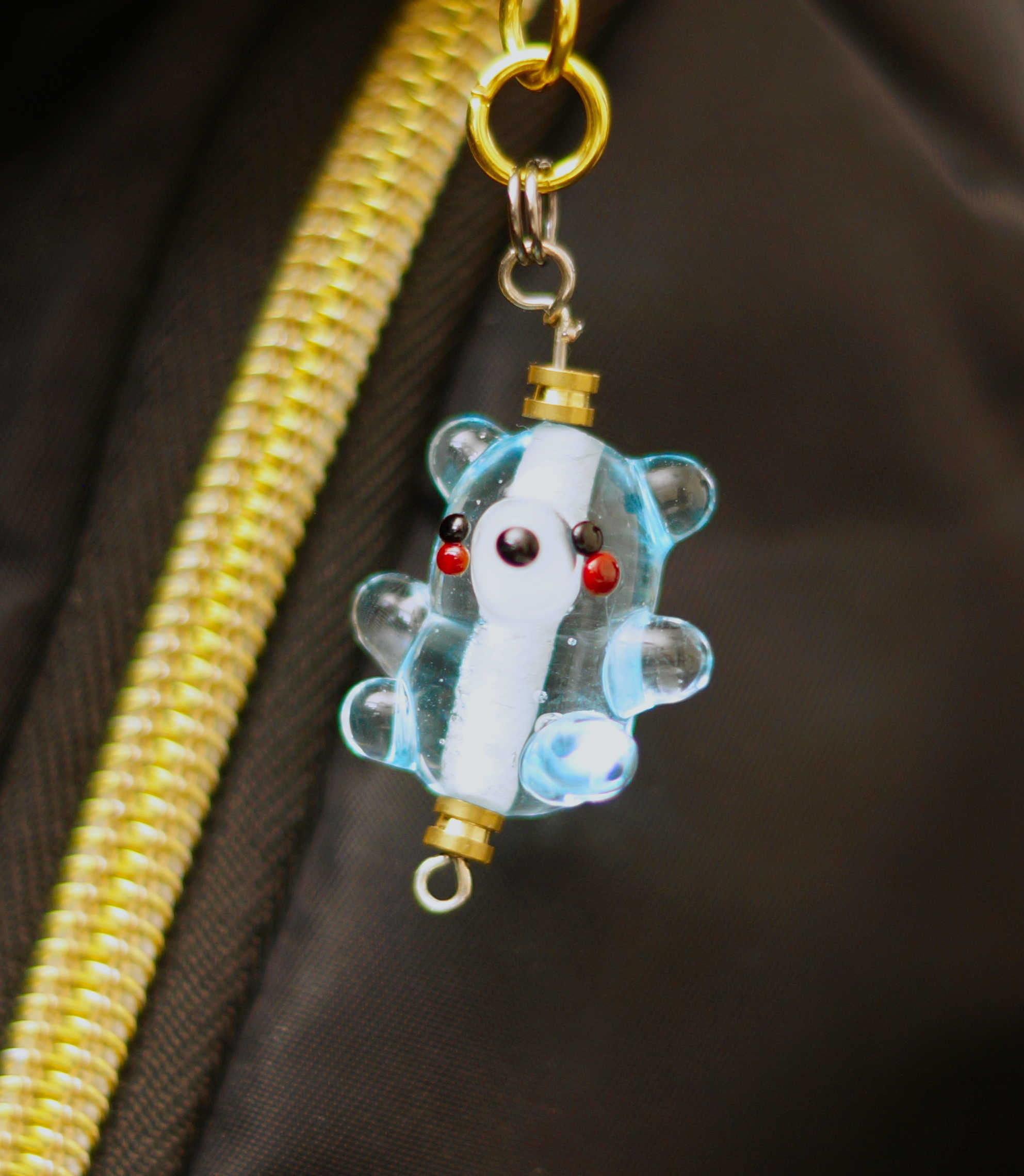Little glass teddy charm on a keychain